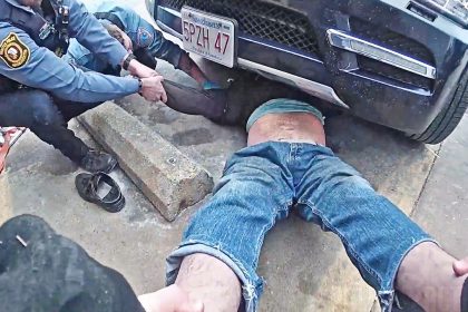Bodycam Shows Rescue of Man Trapped Under Car Outside Auto Parts Store