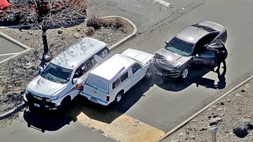 Suspect Calls 911 on Himself Then Drives at Police With Gun Drawn